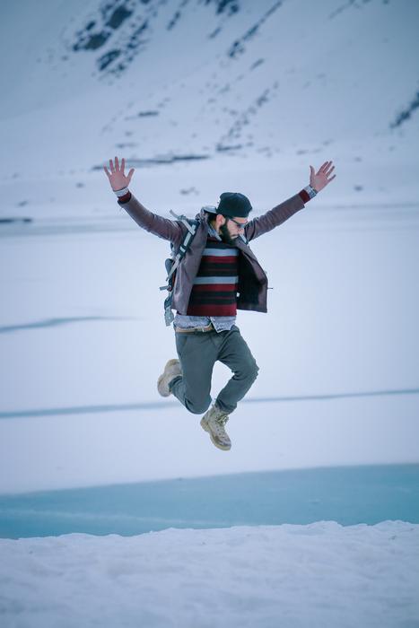 jumping stylish man