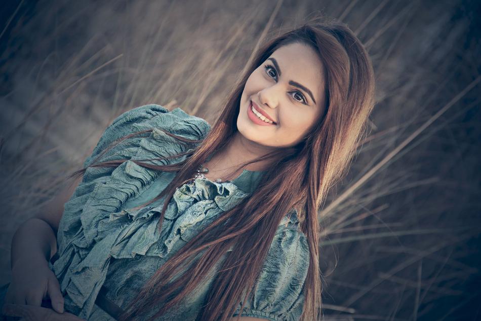 romantic girl posing on the field