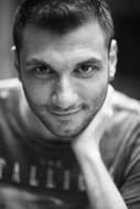 black and white portrait of smiling young man