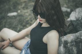 Mysterious Girl Wearing Black Glasses