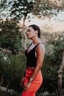 beautiful model in orange skirt