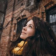 happy woman in snowfall