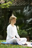 girl meditates in nature