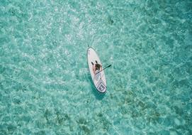 Aerial view of surfboard on Water Ocean