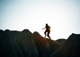 man at the top of the cliff