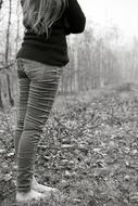 young woman in forest