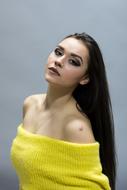 brunette in yellow knitwear
