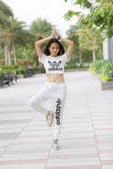 young girl in Adidas wear