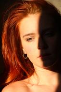 portrait of a woman in light and shadow