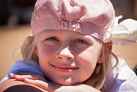 little girl natural beauty close-up on a blurred background