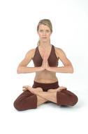 girl sitting in lotus position and meditating