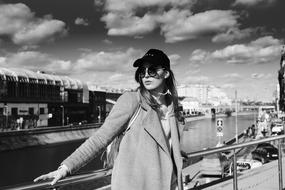 woman in cap in black and white