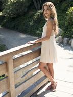 Beautiful Girl Smiling near fence