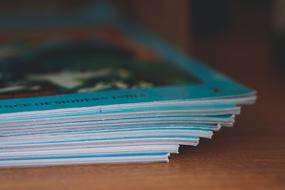 stack of magazines on the table, close-up