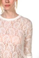 white blouse with patterns on the girl