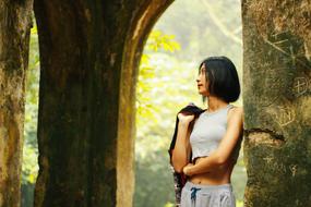 girl posing among old walls