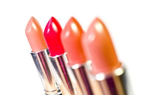 shiny lipstick in a row close-up