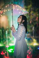 Portrait of Girl with umbrella at Night