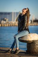 Portrait of Beautiful Woman on pier