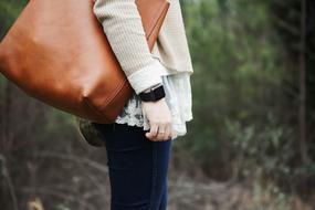 girl Woman with brown leather bag