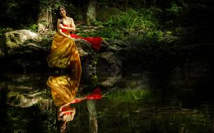 girl at lake coast