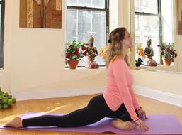 exercising Female in Yoga Pose