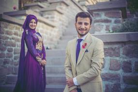 oriental marriage Ceremony, happy young couple at stairway