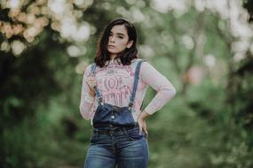 portrait of a girl on a blurred background of nature