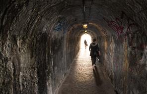 Girl Walking in dark Alley