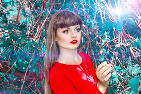 woman in red at a photo shoot