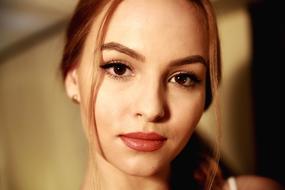 portrait of a girl model on a blurred background