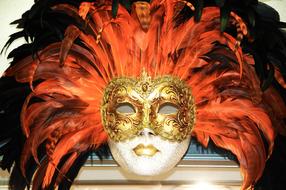 mask with long feathers for the venetian carnival