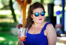 woman in blue posing in summer