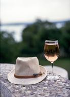 menâs Hat and Rose Wine outdoor
