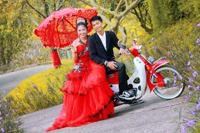 bride and groom on a motorcycle