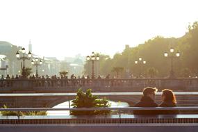 couple in love on a bench in the city