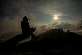 Girl Woman looking at Sunset