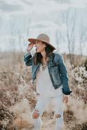 girl posing outdoors on a cloudy day