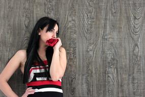 Beautiful Girl standing near wall