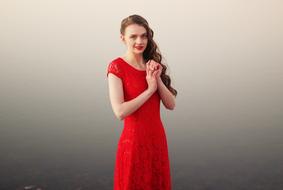 Young Pretty Woman in red dress