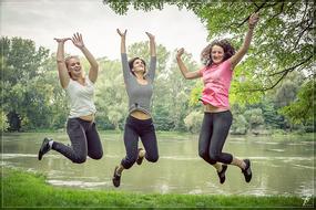 Jumping Happy People at park