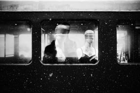 black and white, mannequins in a train car