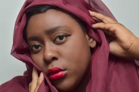 portrait of a woman in a stylish scarf