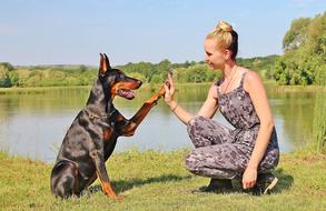 Woman and Dog near lake