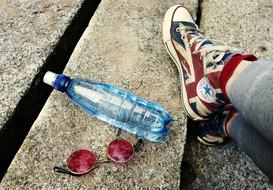 Water Bottle Sunglasses Converse Shoes Photo