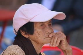 portrait of an elderly Thai woman on a blurred background