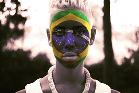 blonde with makeup in Brazilian national colors