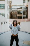 girl in sunglasses near the building