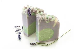 Close-up of the beautiful and colorful soap pieces, among the flowers