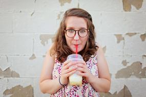 Beautiful girl near Brick Wall